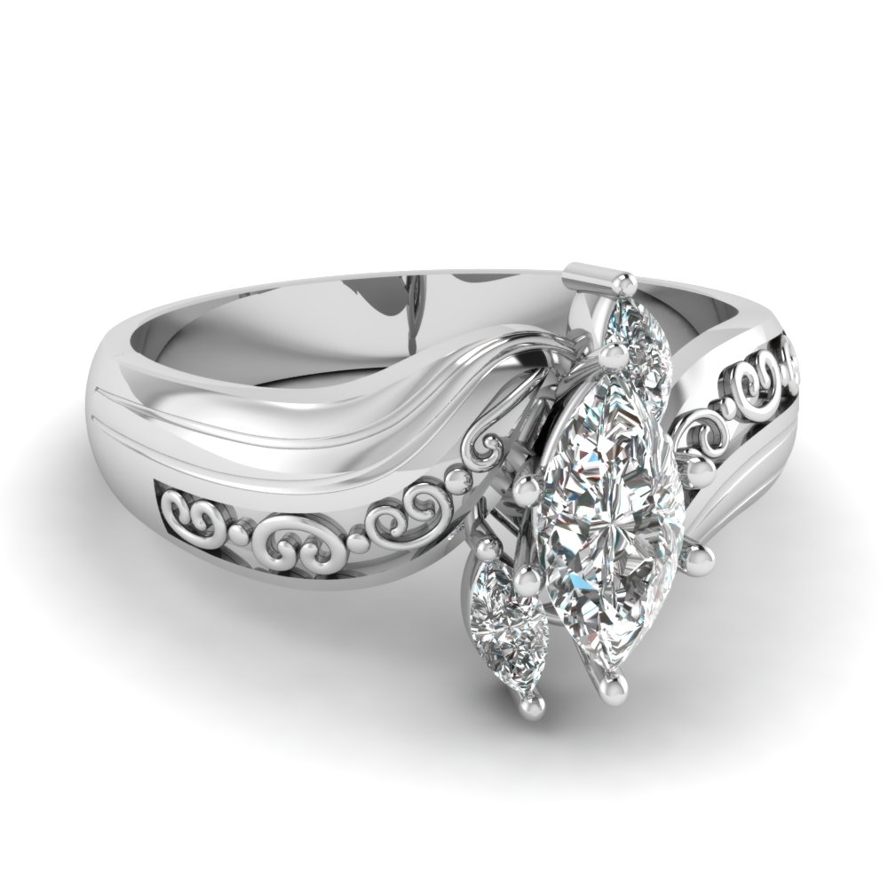 Twisted 3 Stone Marquise Engagement Rings